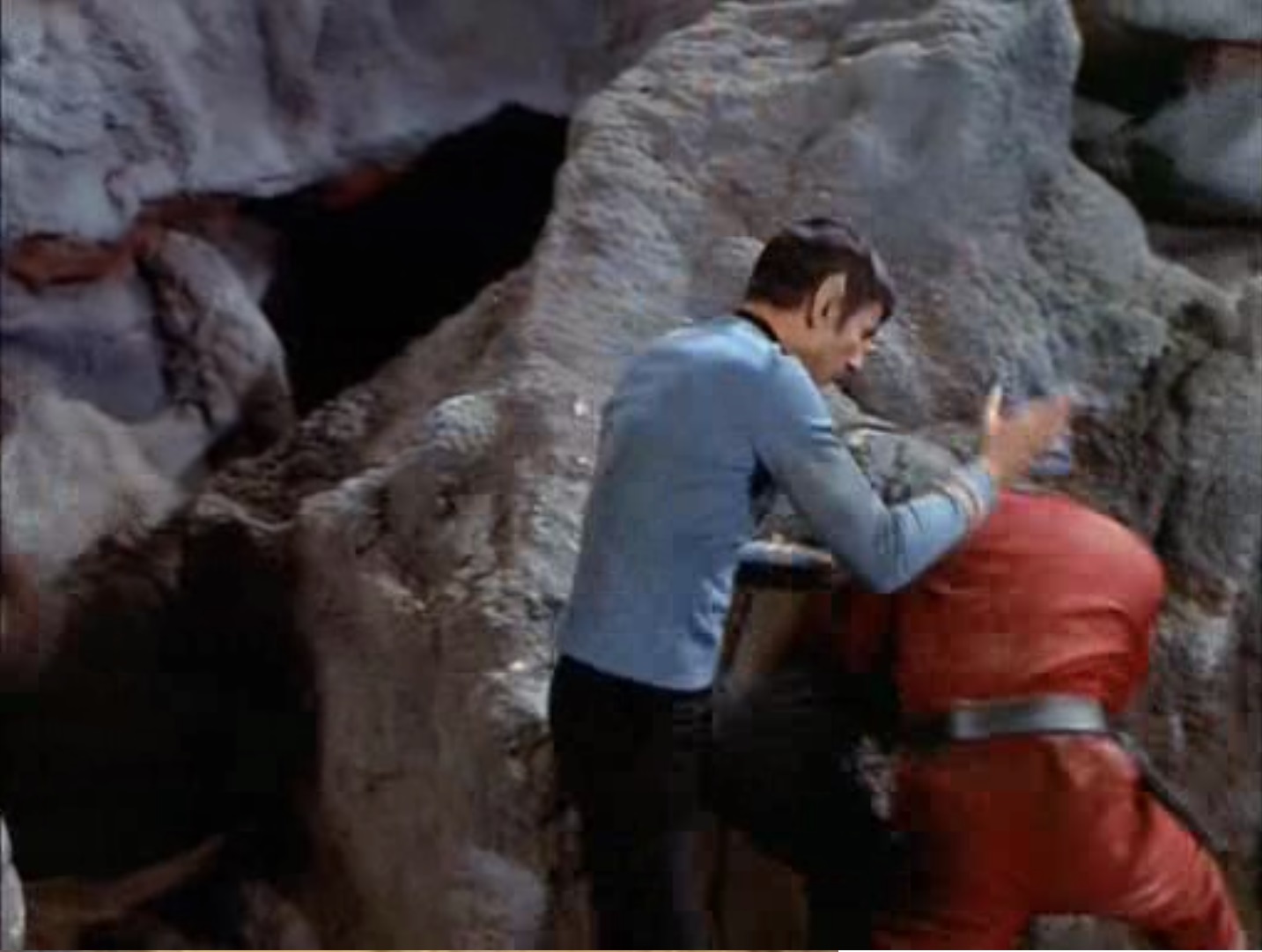 screen capture of Mr. Spock administering a judo chop to a red-jumpsuited mook against a styrofoam rock set