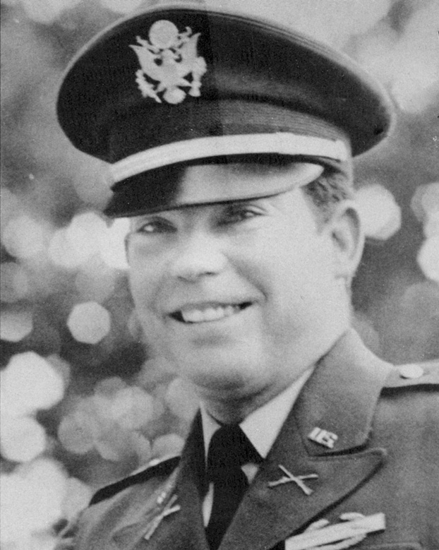 head shot of a smiling Lieutenant Calley, in uniform