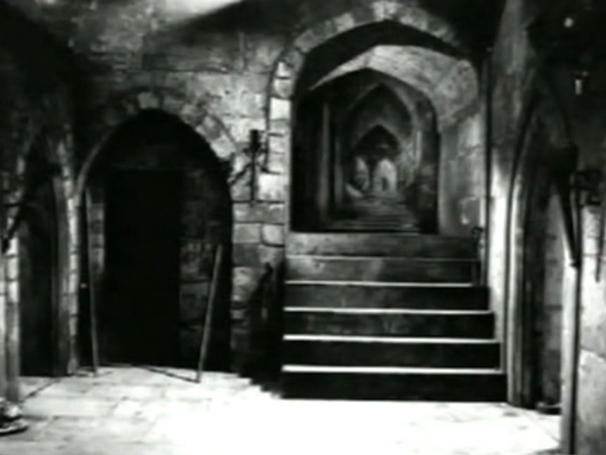 The set of the crypt, with the background painted to create the illusion of depth.