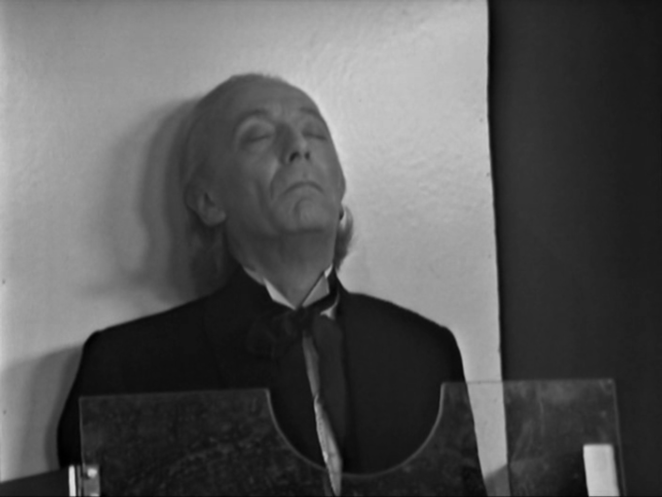 The Doctor, unconscious.