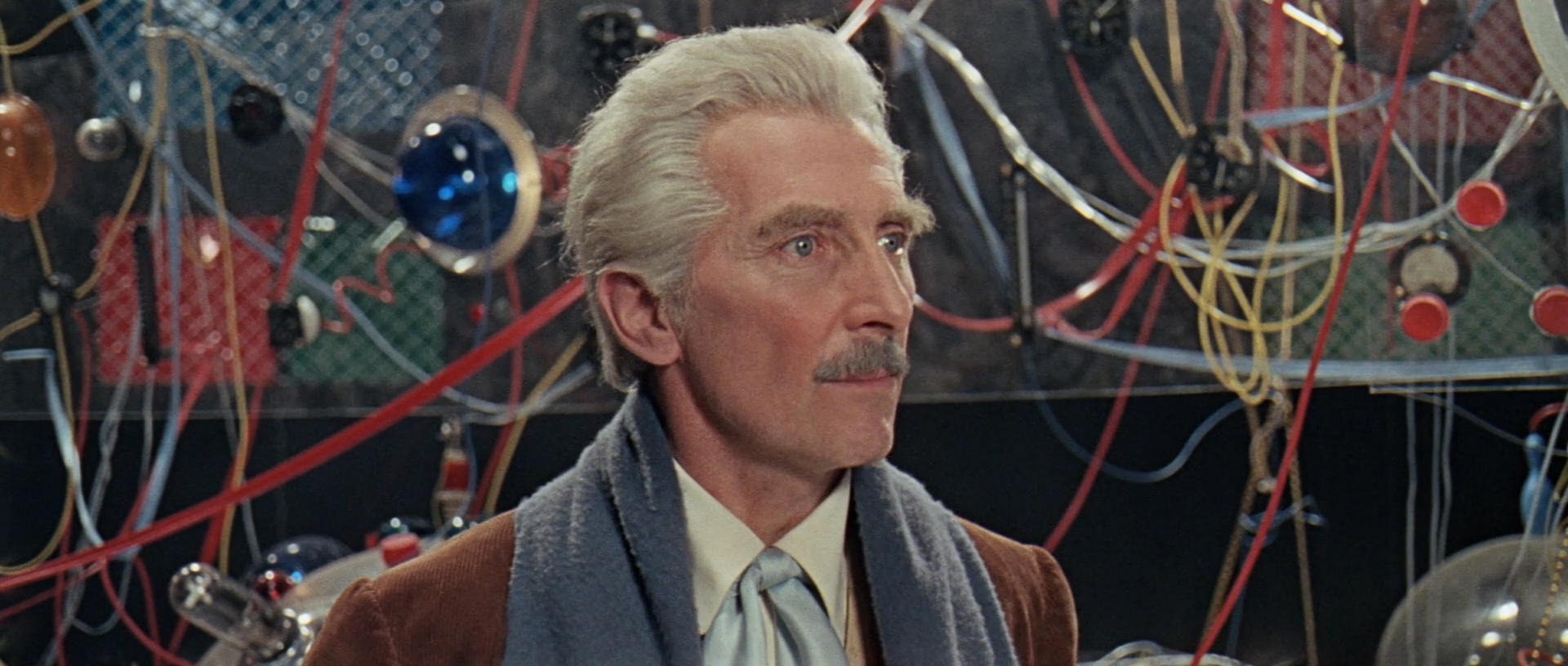 Image description: Close-up shot of Peter Cushing as Dr. Who.