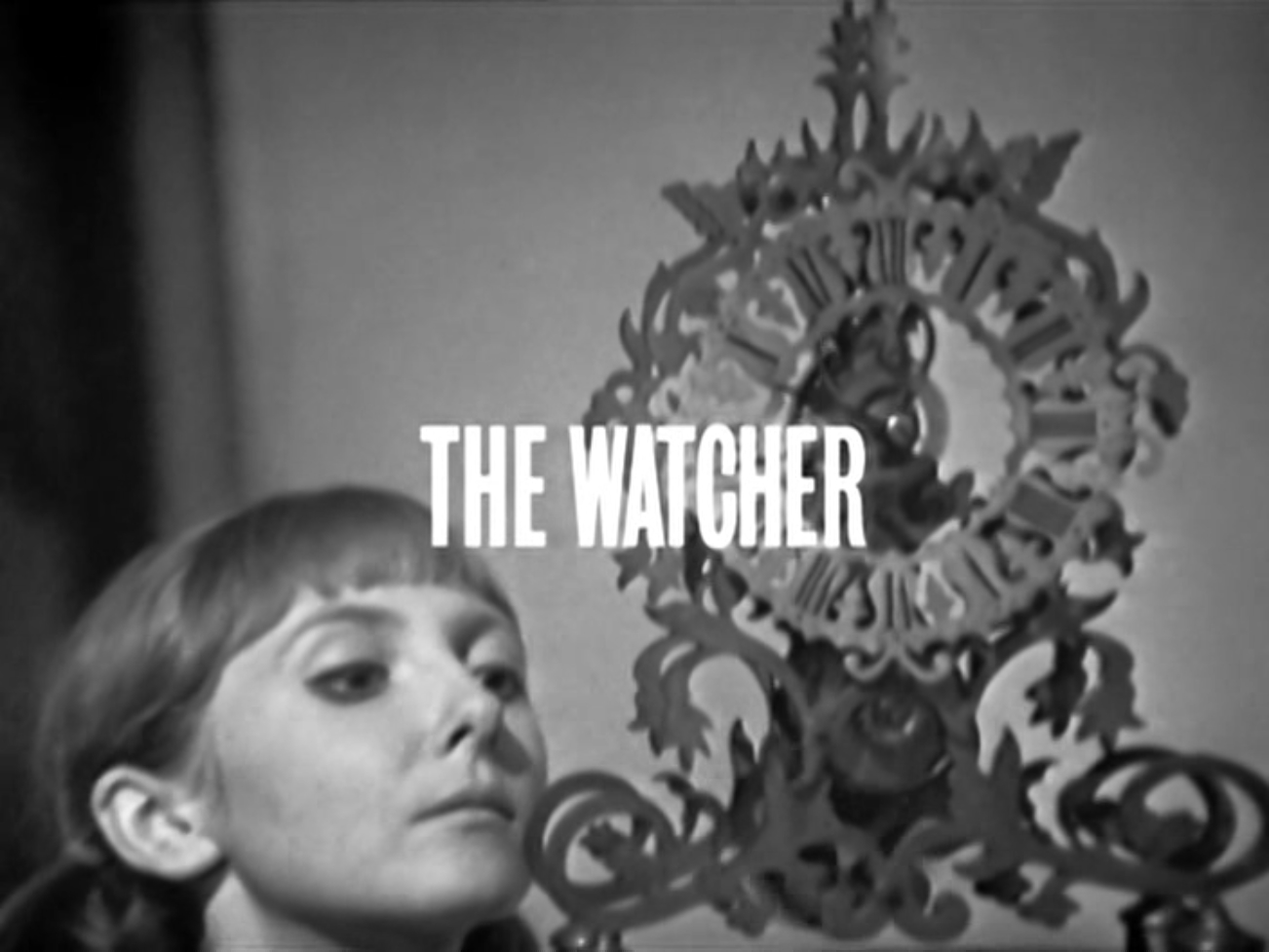 Text reads: The Watcher