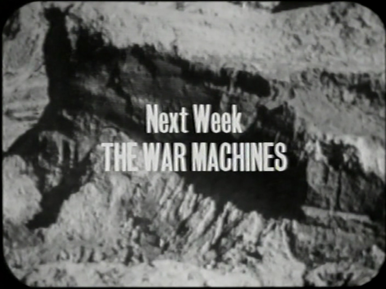 Title card. Text reads: Next Week: THE WAR MACHINES