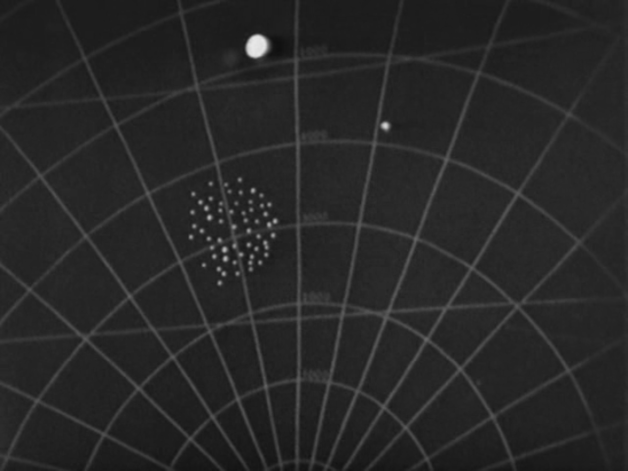 Image: A radar screen showing many white dots representing Cyberships approaching a larger dot representing Earth.