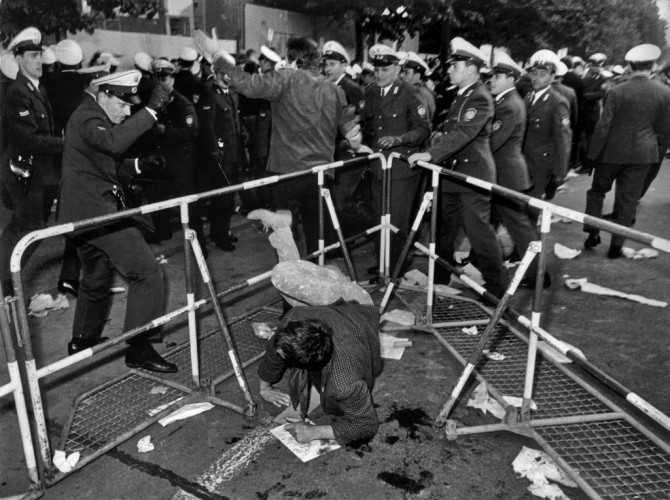 Student falls over barricade while trying to flee