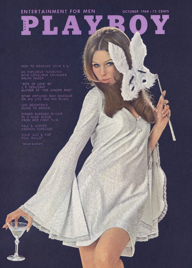 October 1968 Playboy cover, featuring a woman in a short silver-white dress with long angel sleeves, holding a bunny mask near her face