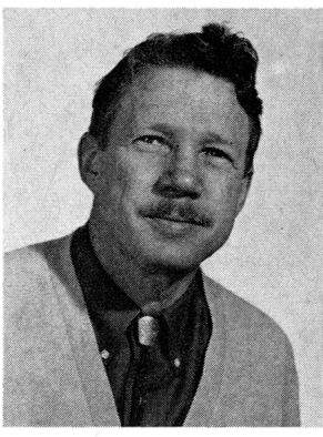 A headshot photograph of Dr. William W. Kellogg, a white man with brown hair.