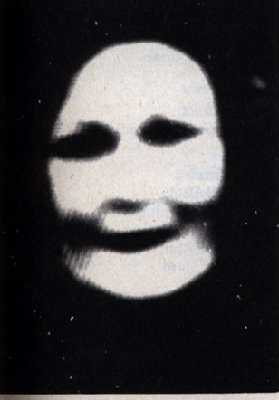 Art for Computer 70: Dreams and Lovepoems by D.M. Thomas. A blurred image of a white smiling human face.