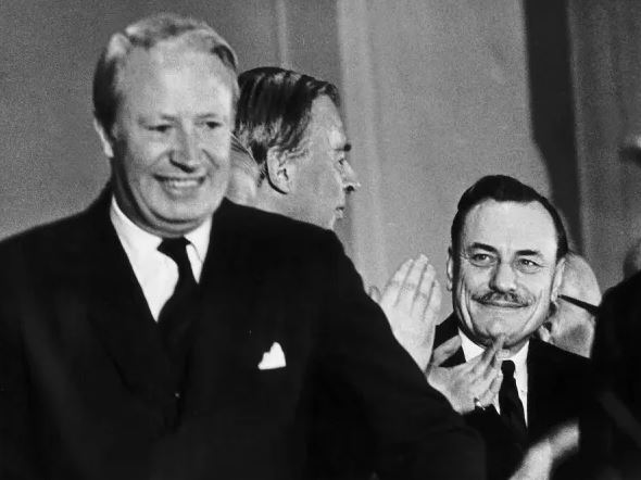 Edward Heath left and Enoch Powell right