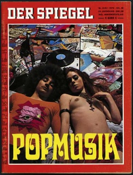 The cover of Der Spiegel. The title is written in white block capitals along the top, against a red background that frames a photo of two hippies lying on blankets outside, one wearing a shirt and the other not.  The word POPMUSIK is written in stylized capitals in yellow across the bottom of the photo.