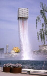 A fountain at Expo 70. A cube on top of a long pole with water pouring from the base of the cube.